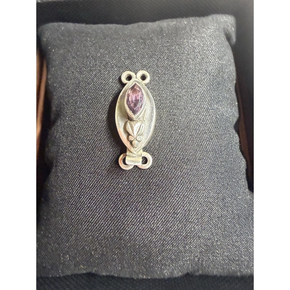 Sterling Silver jewelry clasp adorned with an amethyst